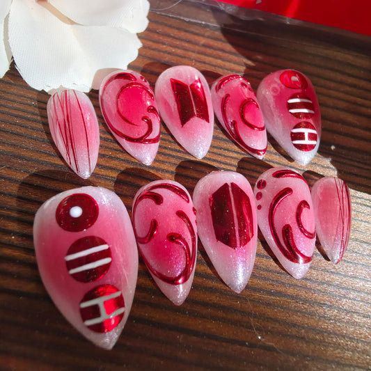 Luxury handmade press-on nails inspired by BTS. Arirang design available in red or purple. Custom sized gel nails with salon-quality shine. Reusable & made to order.