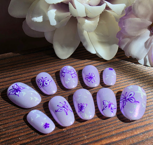 Purple butterfly press-on nails inspired by BTS symbolism. Handmade, reusable luxury nails available in 17 shapes and lengths. Perfect for ARMY aesthetic lovers.