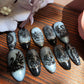 Black Swan luxury press-on nails inspired by BTS. Handmade gel nails in elegant black with custom sizing for a salon-quality fit. Reusable, durable, and perfect for statement nail looks.