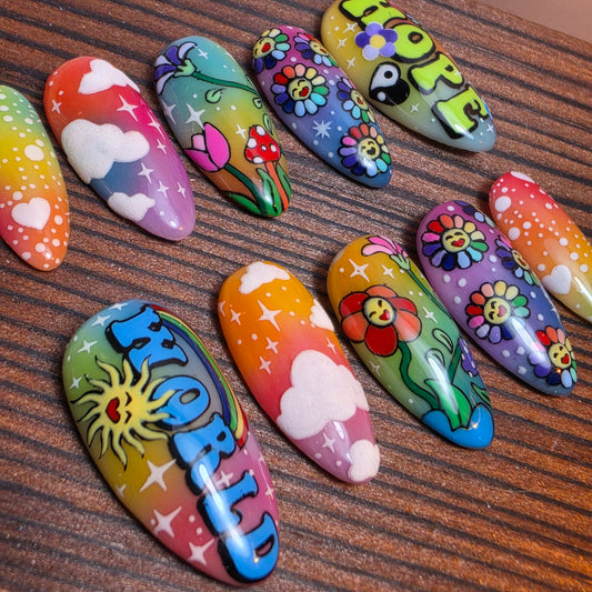 Colorful press-on nails inspired by J-Hope’s Hope World featuring rainbow gradients, retro flowers, clouds, and playful pop-art design. Handmade luxury nails.