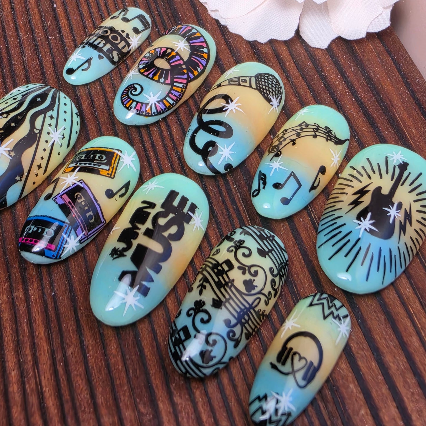 Glow in the dark press-on nails inspired by Jimin’s MUSE album featuring soft gradients and luminous artistic details. Handmade luxury nails.