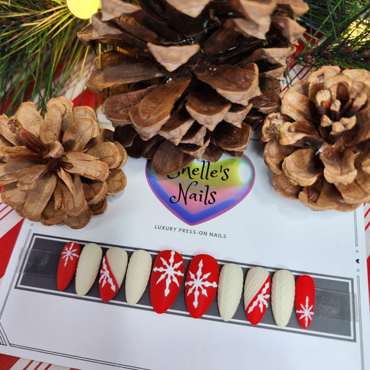 Winter Press-On Nails
Snowflake Nail Designs
Reusable Gel Nail Extensions
Holiday press-on nails
Christmas sweater nails
Get festive with our Winter Wonderland Press-On Nails. Featuring cream sweater patterned nails, red nails with white glitter snowflakes. the reusable gel extension set is perfect for the holiday season. 